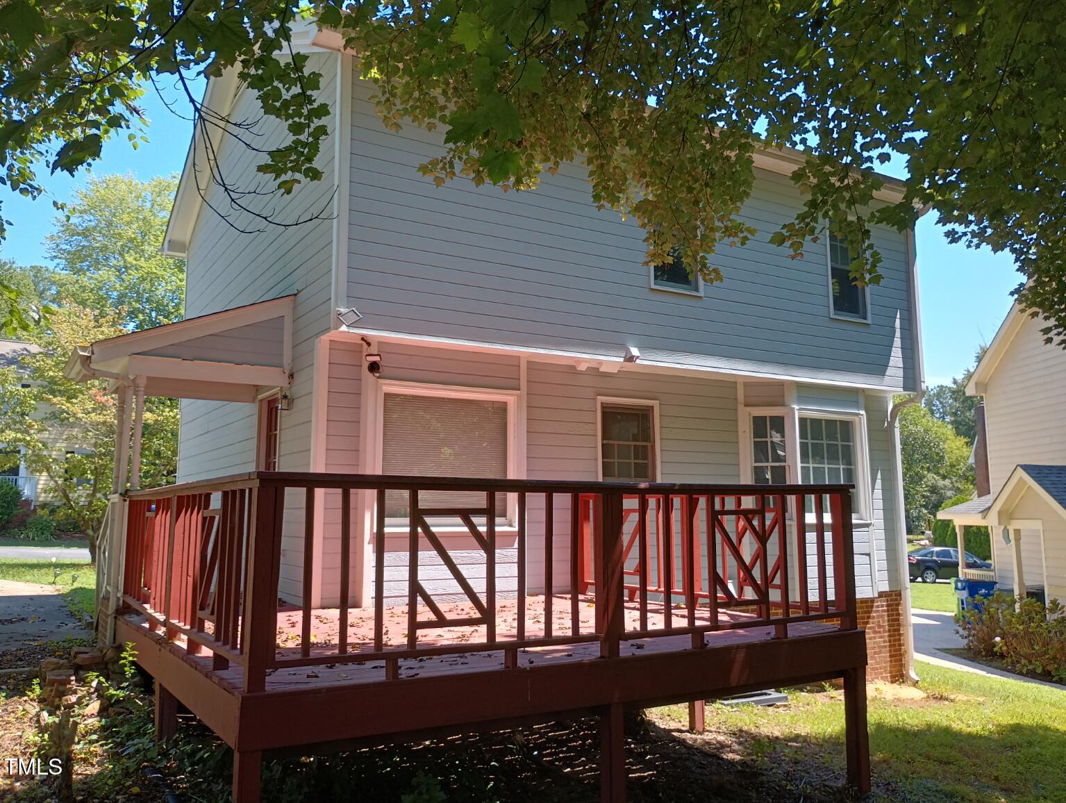 3504 East Jameson Road Raleigh, NC 27604 - Photo 34 of 35 a view of a house with a wooden deck