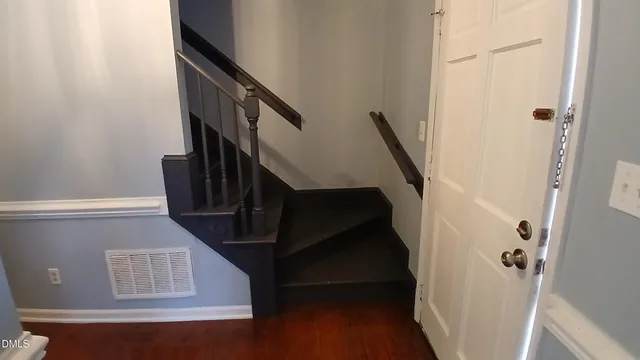 a view of entryway with wooden floor