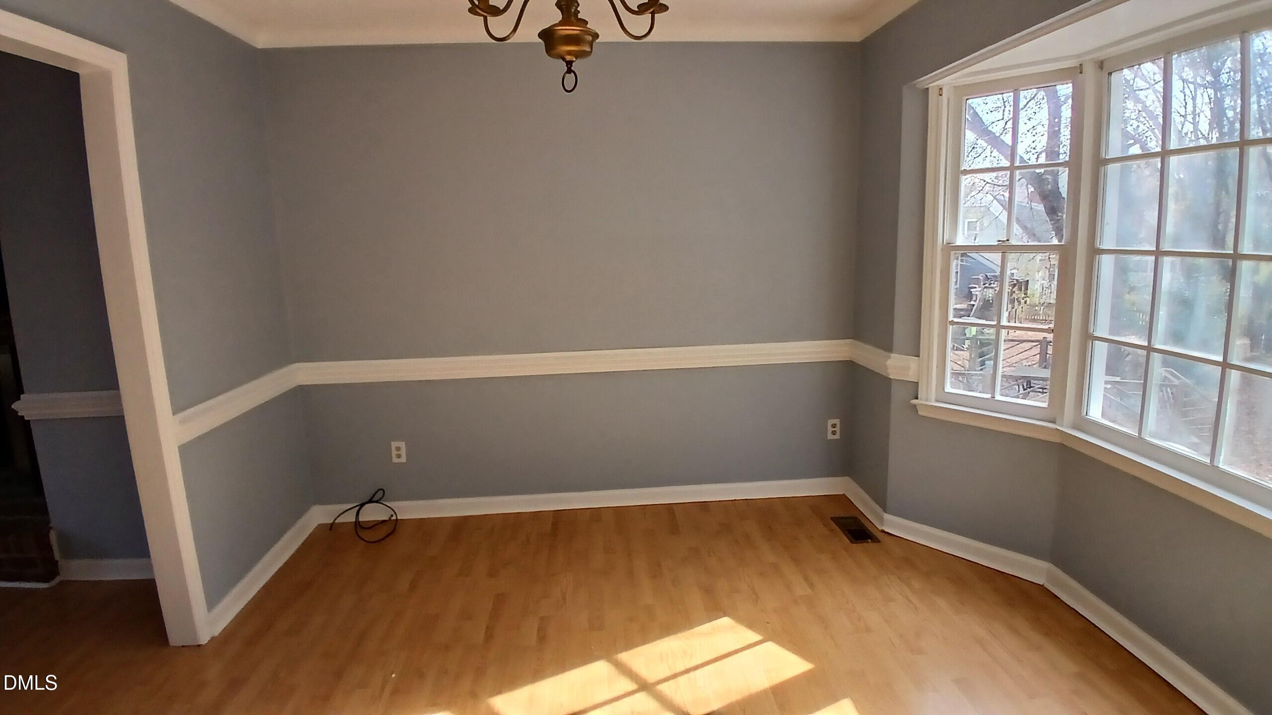 3504 East Jameson Road Raleigh, NC 27604 - Photo 9 of 35 an empty room with a window