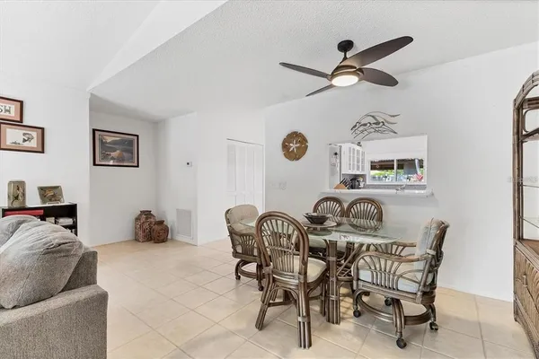 a living room with furniture window and a fireplace