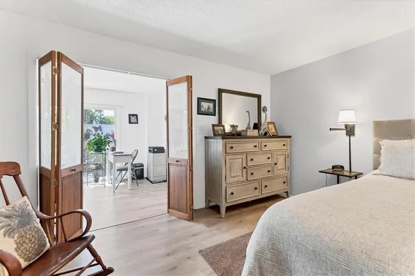 a bedroom with a bed and furniture