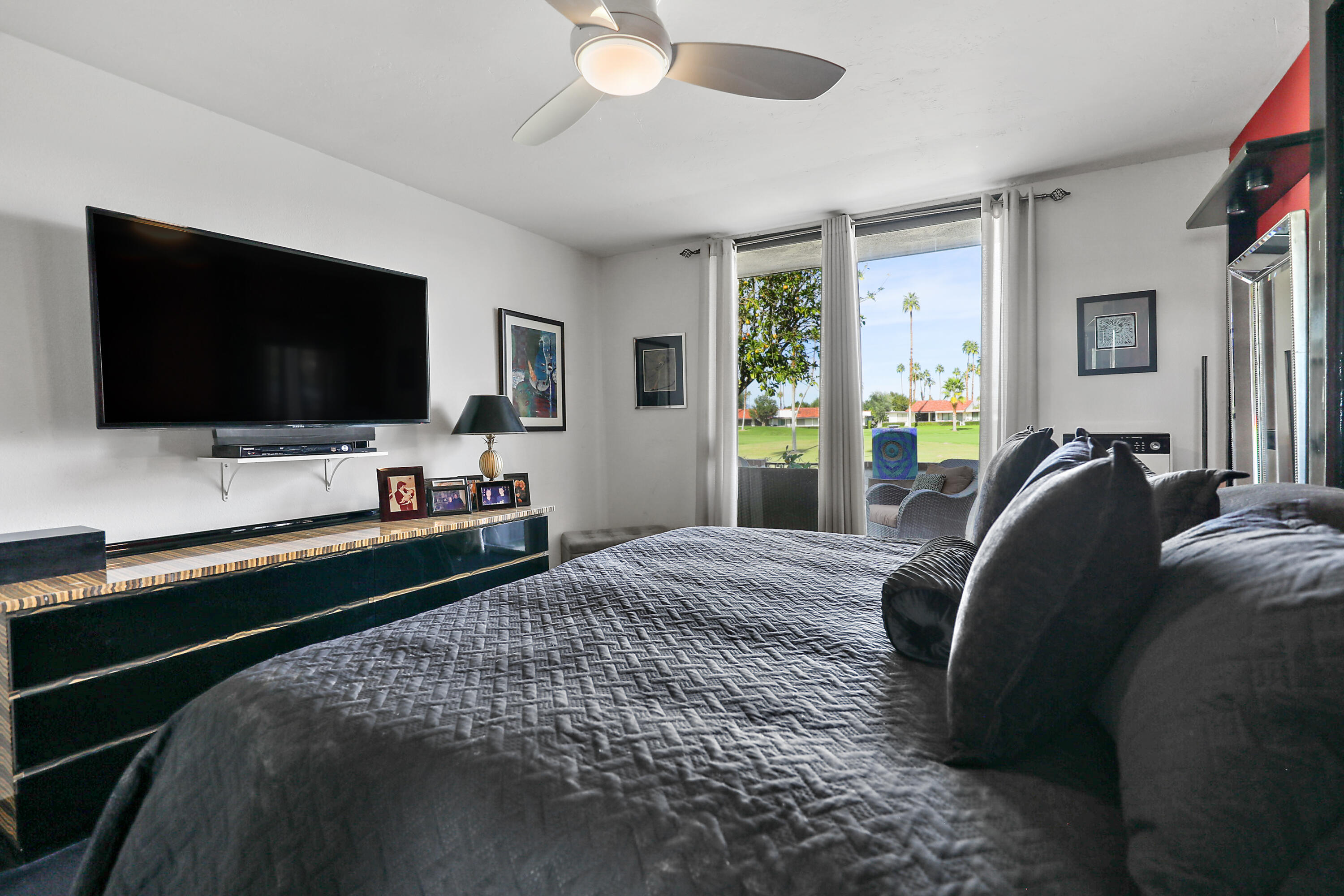 38 San Sebastian Drive Rancho Mirage, CA 92270 - Photo 24 of 45 a bedroom with bed and tv