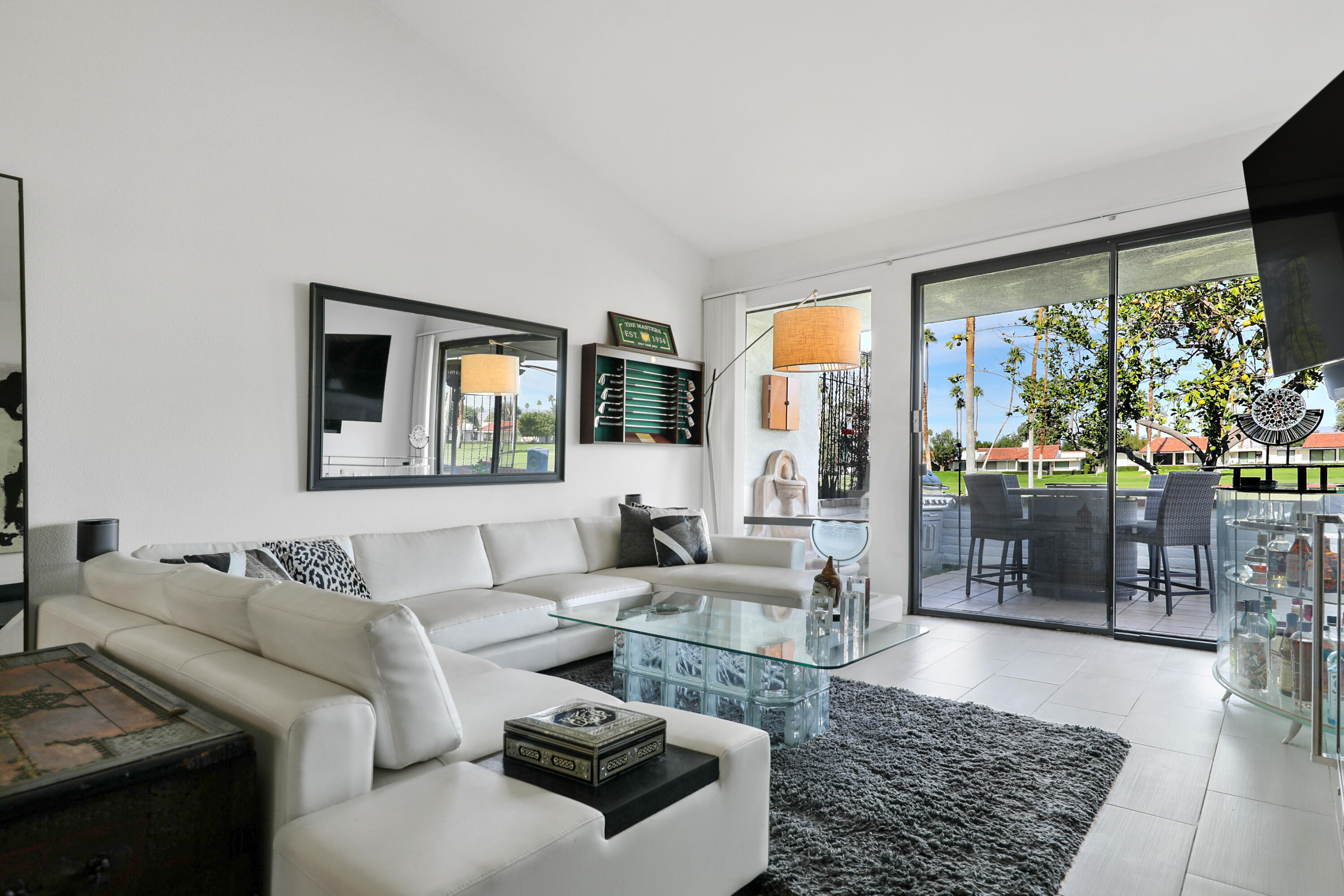 38 San Sebastian Drive Rancho Mirage, CA 92270 - Photo 3 of 45 a living room with furniture and a large window