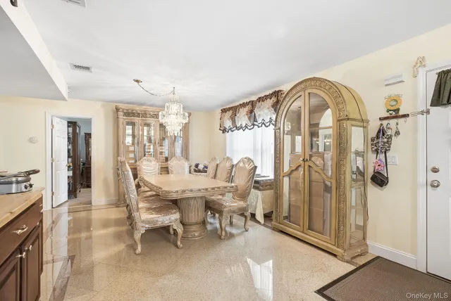 a view of a livingroom with furniture and window