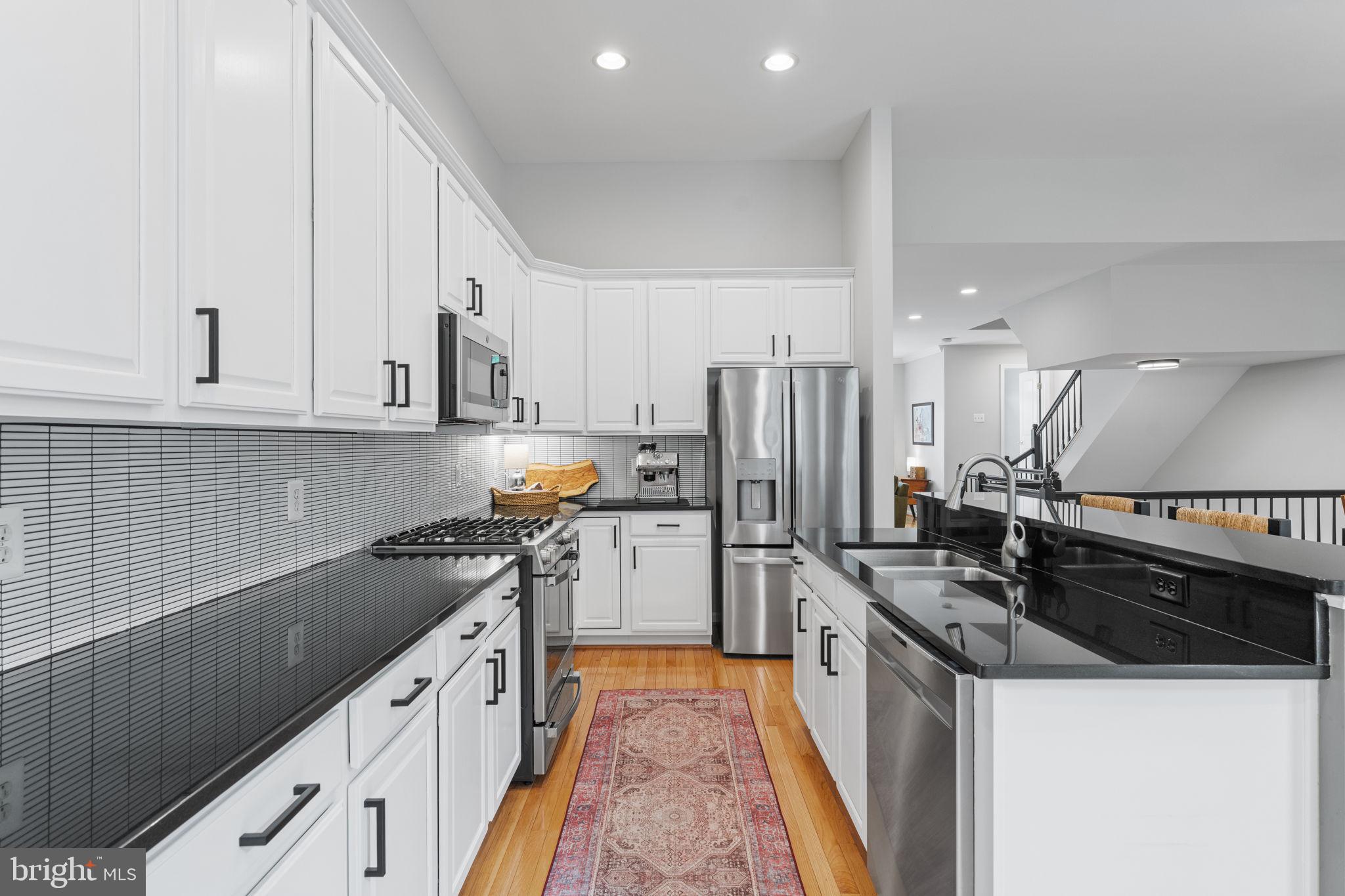 7366 Stream Bluff Way Springfield, VA 22153 - Photo 13 of 46 Kitchen with stainless appliances