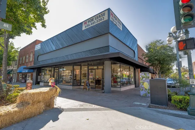 a view of a building with sitting area