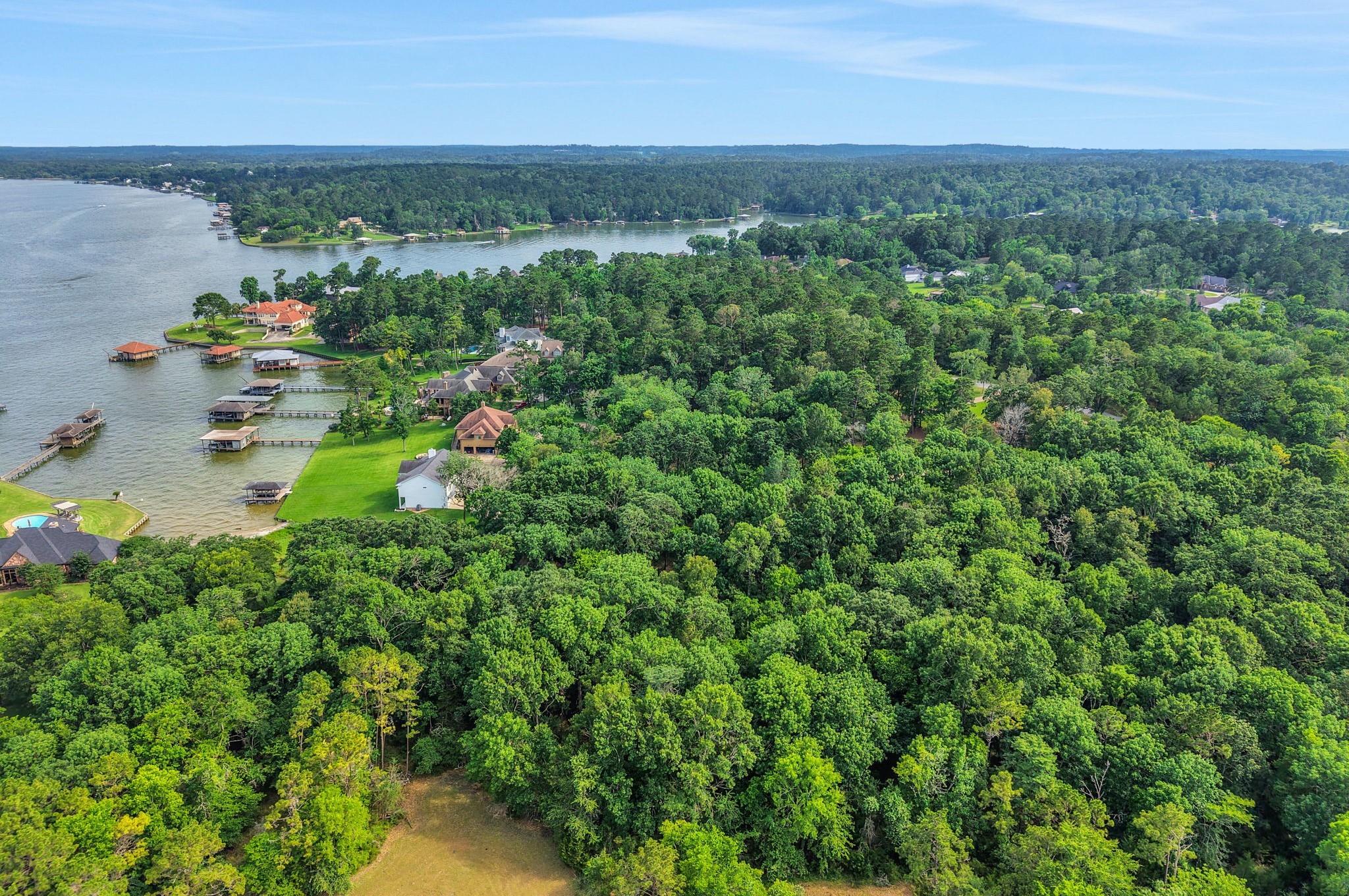 231 Ridge Cove Lane Coldspring, TX 77331 - Photo 2 of 50 Located in The Reserves section, the property totals 4.97 acres - providing privacy and space like no other