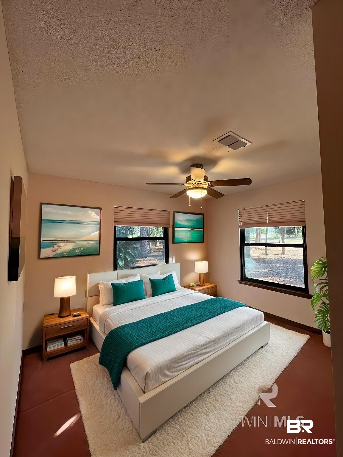 2682 Pine Ridge Drive Lillian, AL 36549 - Photo 11 of 37 Bedroom featuring multiple windows, ceiling fan, and a textured ceiling