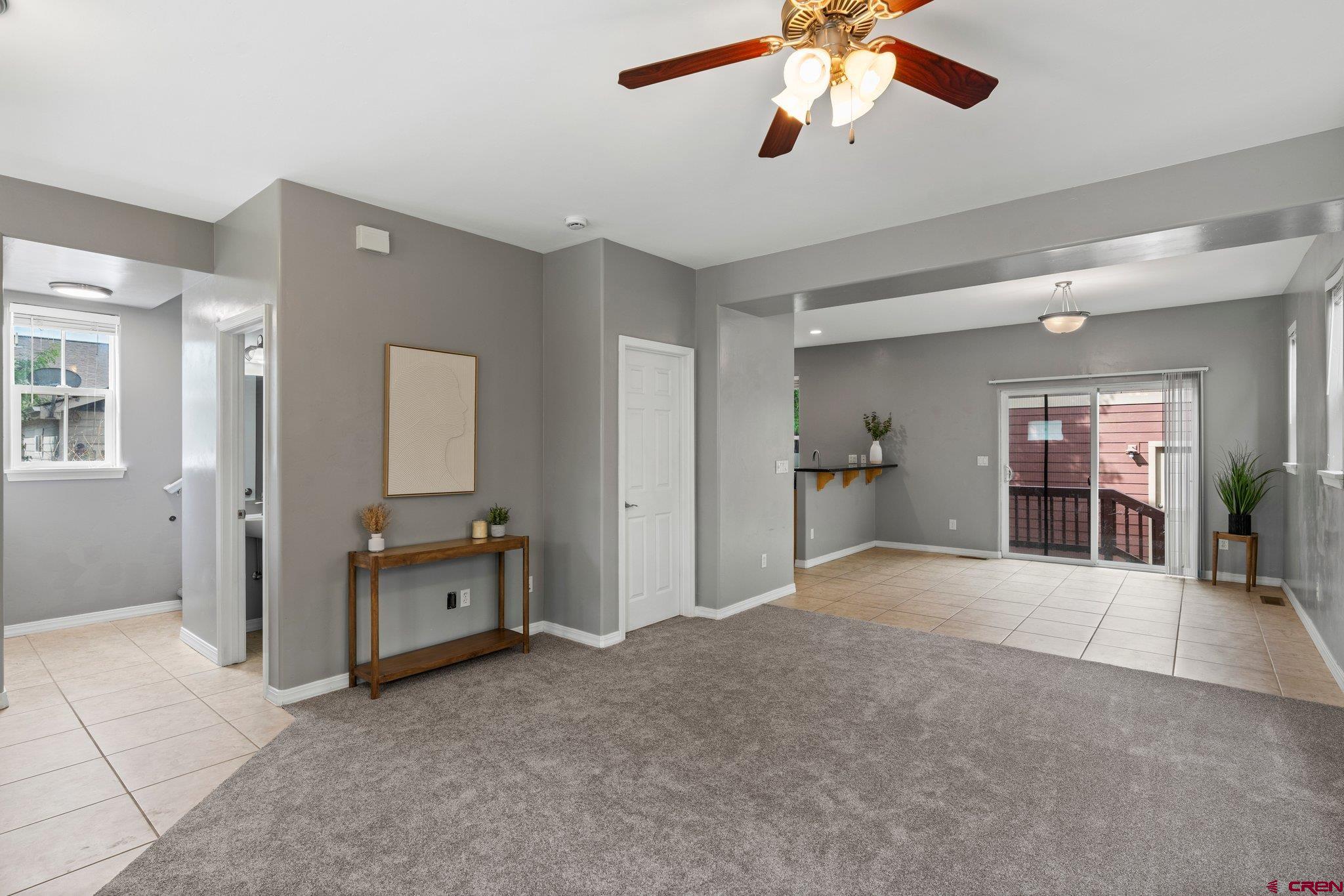 235 Clear Spring Avenue Durango, CO 81301 - Photo 3 of 35 a view of empty room with a ceiling fan and window