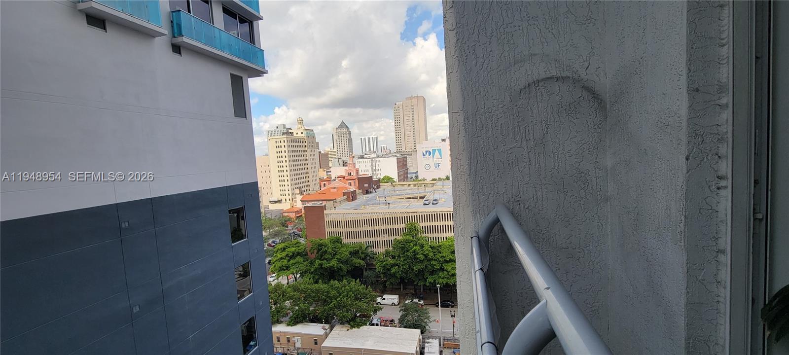 234 Northeast 3rd Street, Unit 1209 Miami, FL 33132 - Photo 8 of 12 a view of balcony with a potted plant