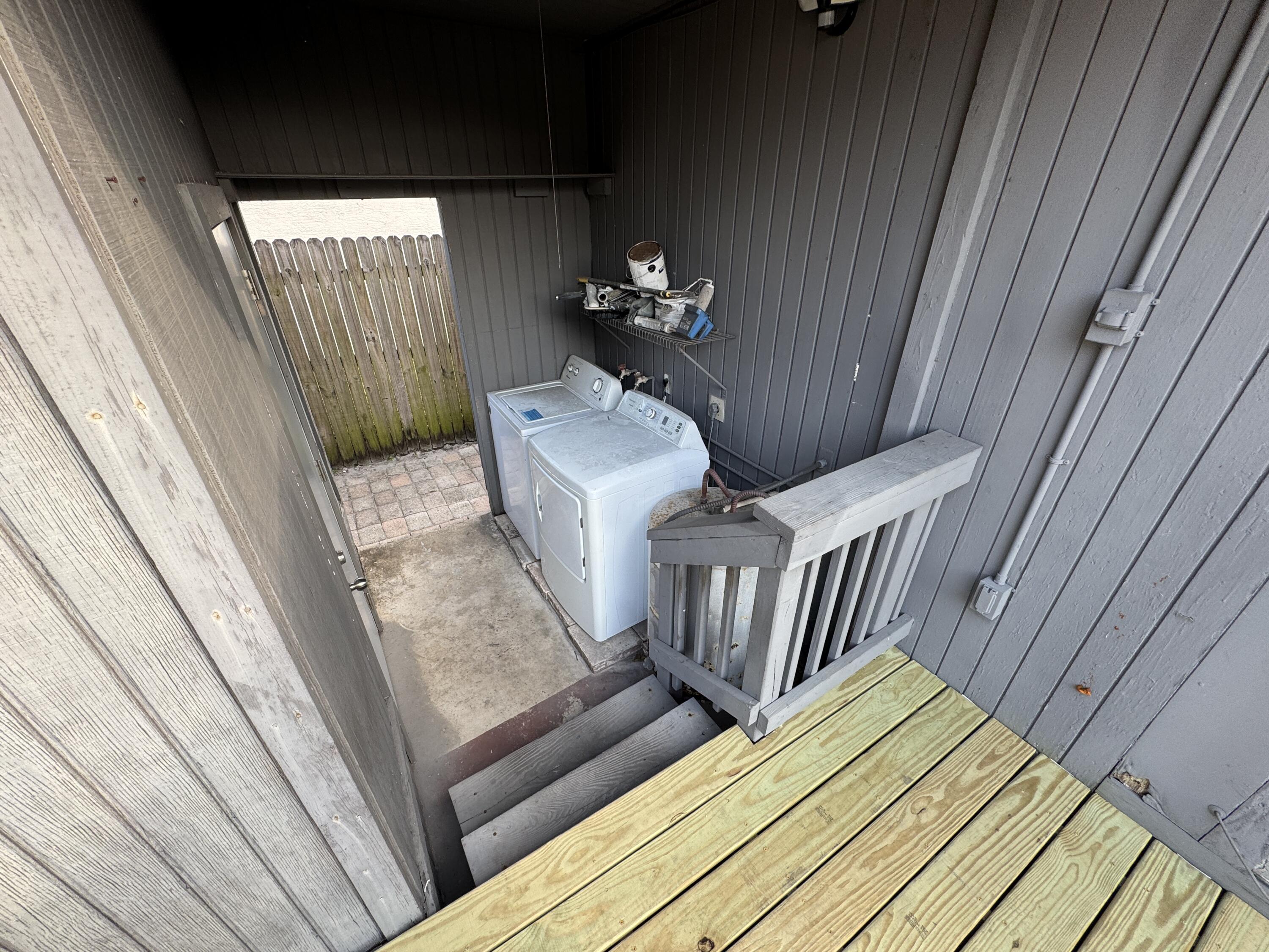 5645 Papaya Road Royal Palm Estates, FL 33413 - Photo 19 of 23 a view of balcony with furniture