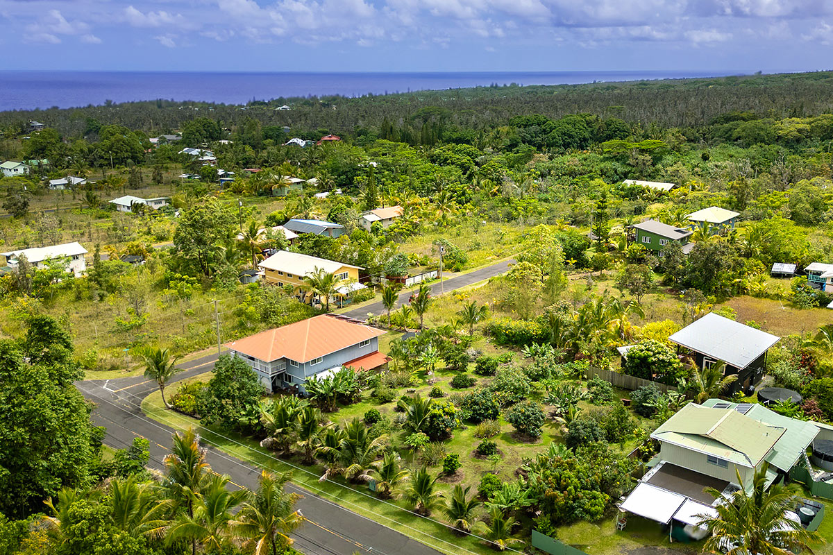 109 Mapuana Avenue Pahoa, HI 96778 - Photo 2 of 30 an aerial view of residential houses with outdoor space and trees all around