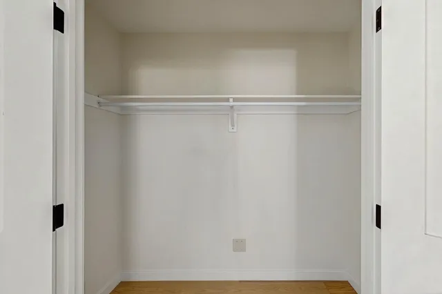 a view of small space with racks on the wall