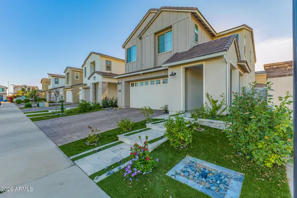 front view of a house with a yard