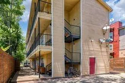 a view of a street with building