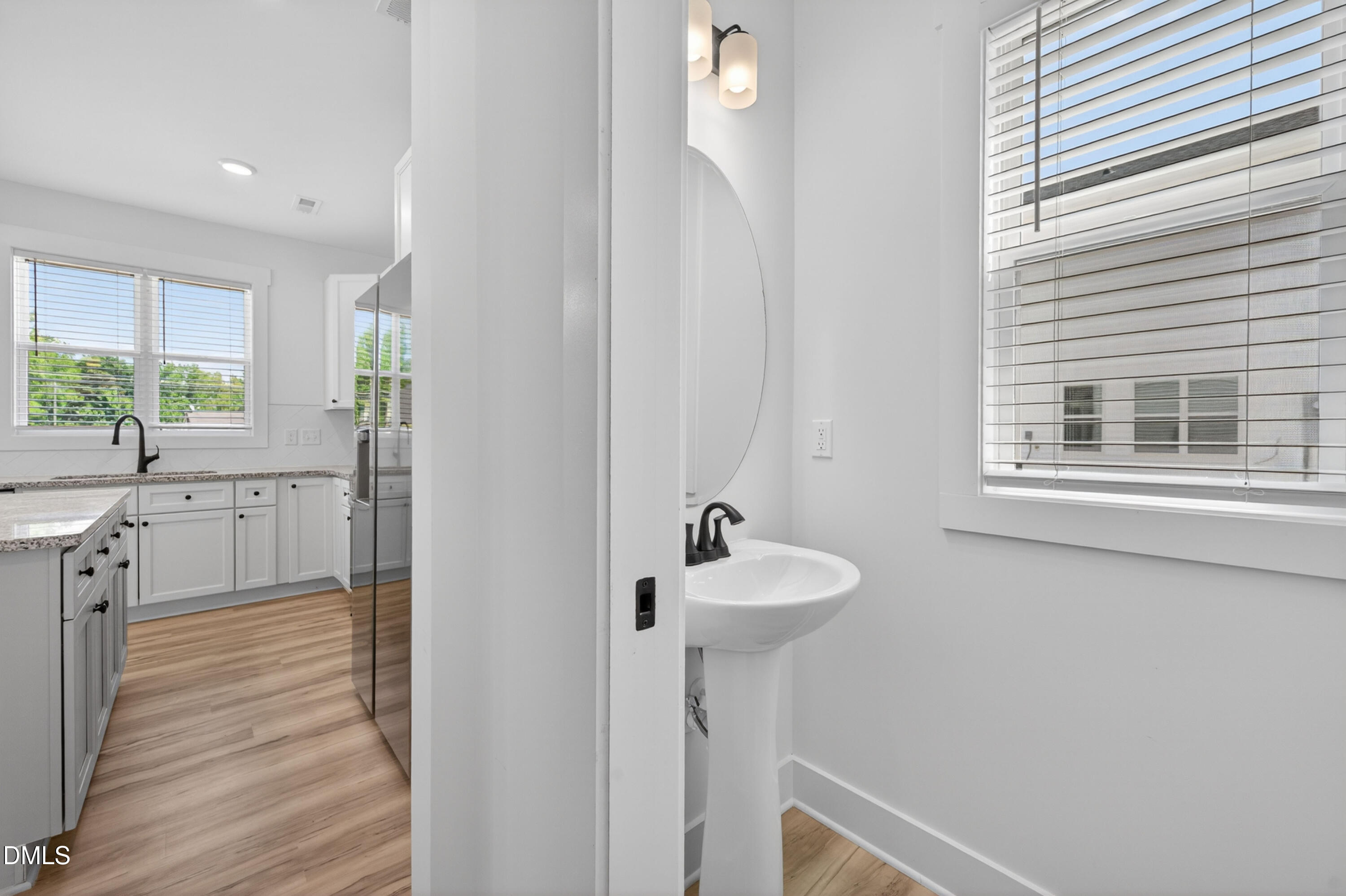 1182 Hurdle Mills Road Roxboro, NC 27573 - Photo 18 of 45 a bathroom with a sink and a mirror