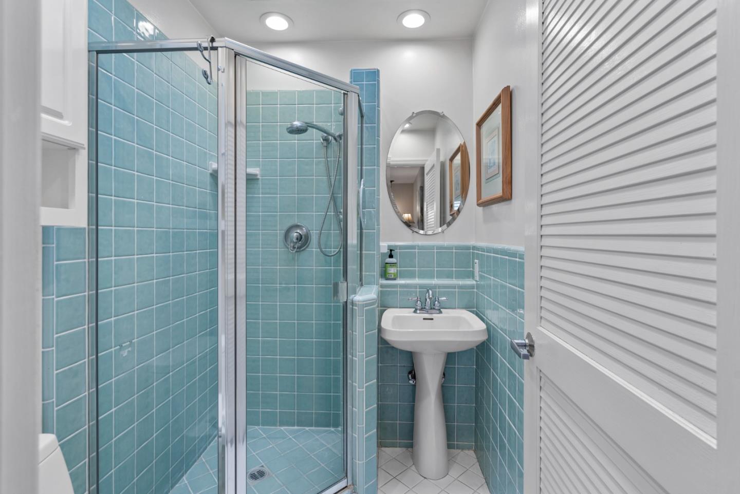 512 Cedar Street Aptos, CA 95003 - Photo 13 of 20 a bathroom with a sink a toilet and shower