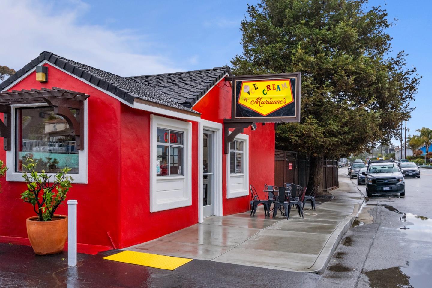 512 Cedar Street Aptos, CA 95003 - Photo 17 of 20 a swimming pool with red chairs