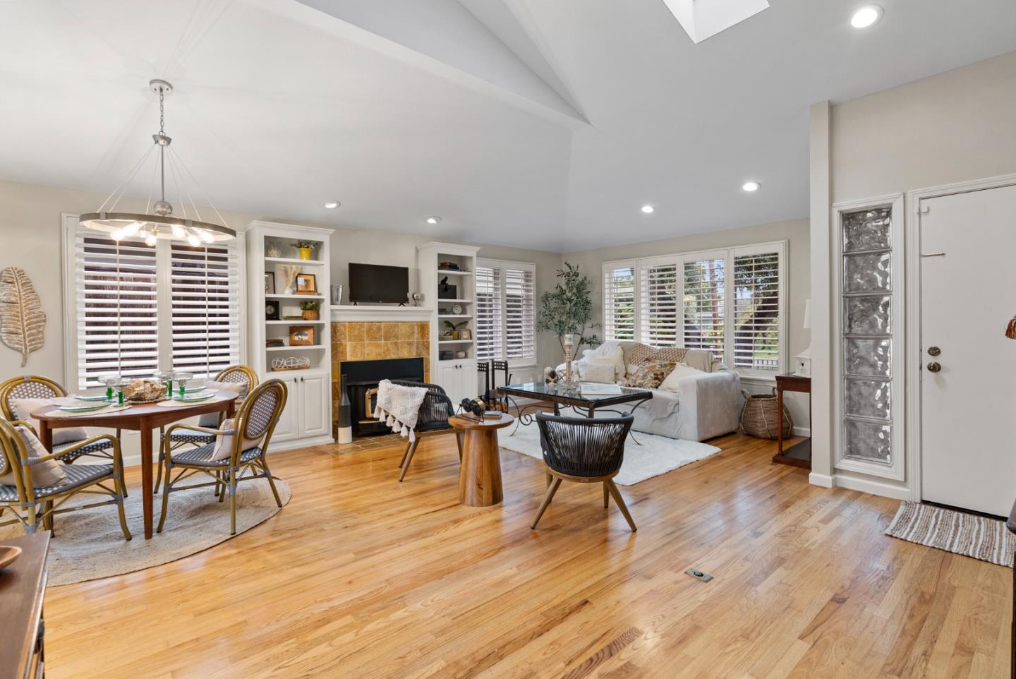 512 Cedar Street Aptos, CA 95003 - Photo 4 of 20 a living room with fireplace furniture and a wooden floor