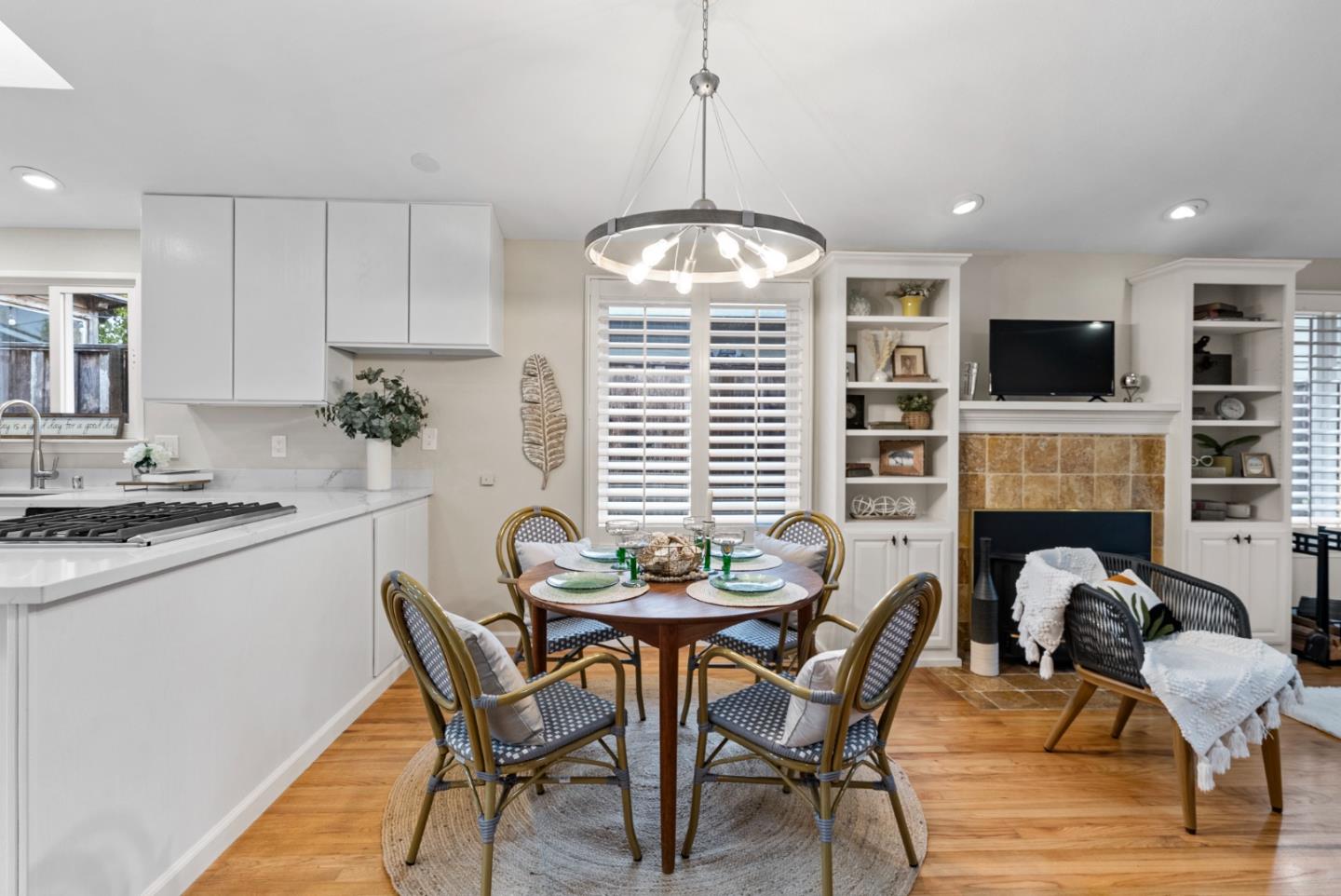 512 Cedar Street Aptos, CA 95003 - Photo 5 of 20 a dining room with furniture a chandelier and wooden floor