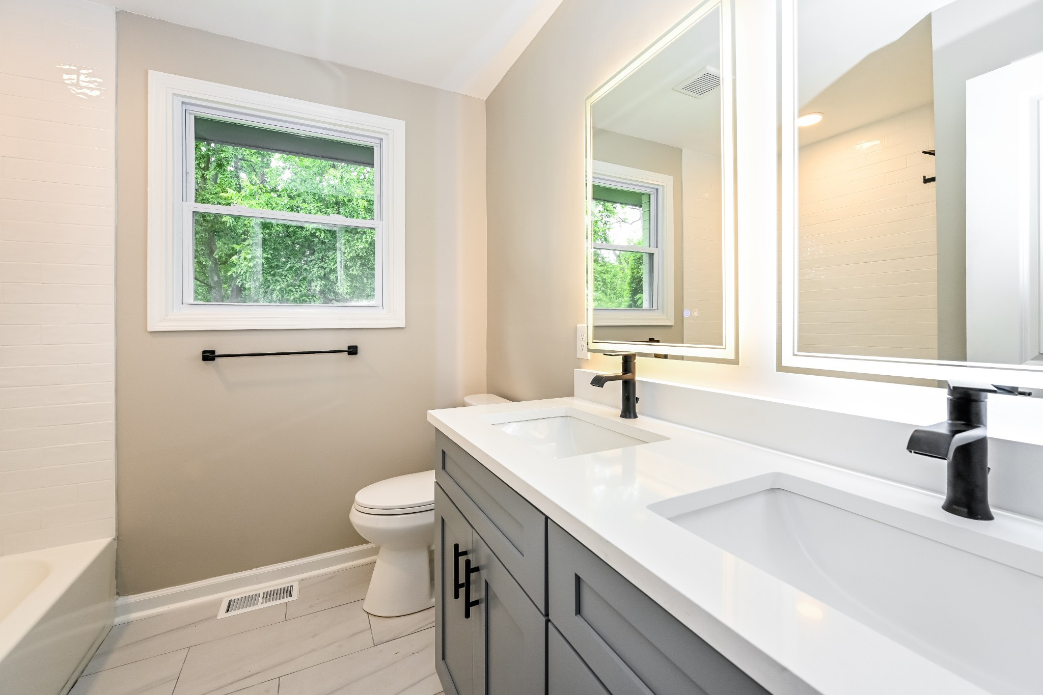 4932 Aquatic Road Nashville, TN 37211 - Photo 14 of 16 a bathroom with a sink a toilet and a window