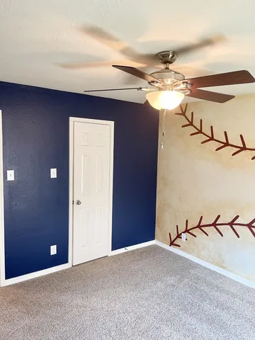 a view of a room with an empty space