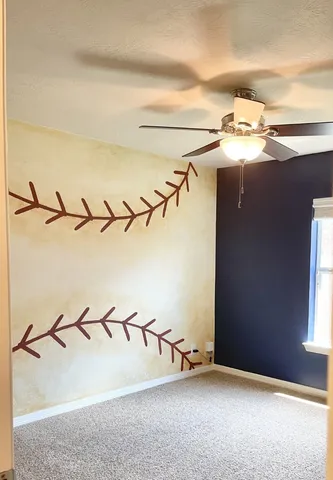 a bathroom with a toilet a sink and a mirror