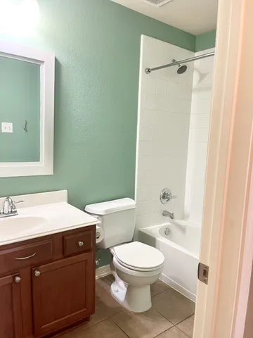 a house view with a garden space