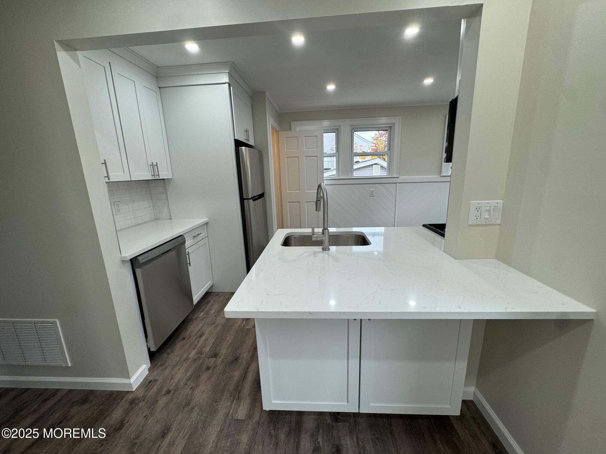 11 Washington Avenue, Unit 1 Leonardo, NJ 07737 - Photo 11 of 23 a room with wooden floor and entryway