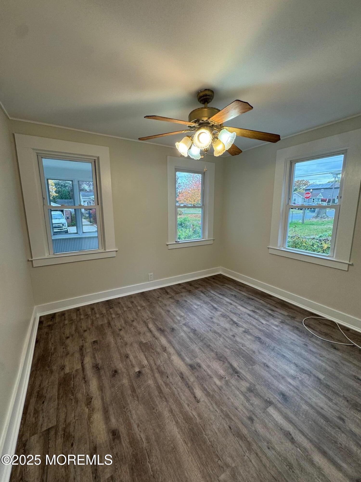 11 Washington Avenue, Unit 1 Leonardo, NJ 07737 - Photo 17 of 23 a view of an empty room with window and chandelier fan