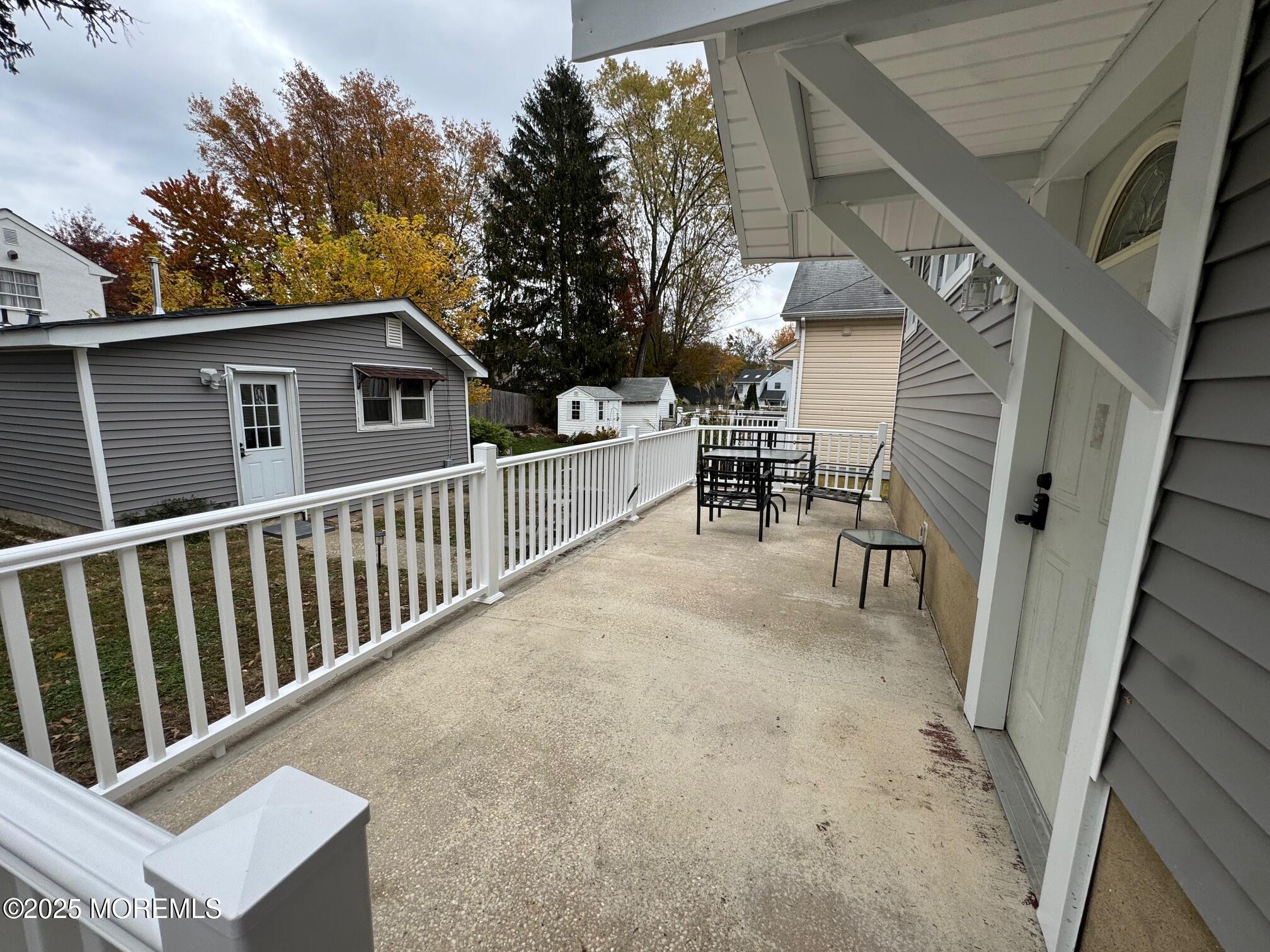 11 Washington Avenue, Unit 1 Leonardo, NJ 07737 - Photo 21 of 23 a balcony with wooden floor and fence