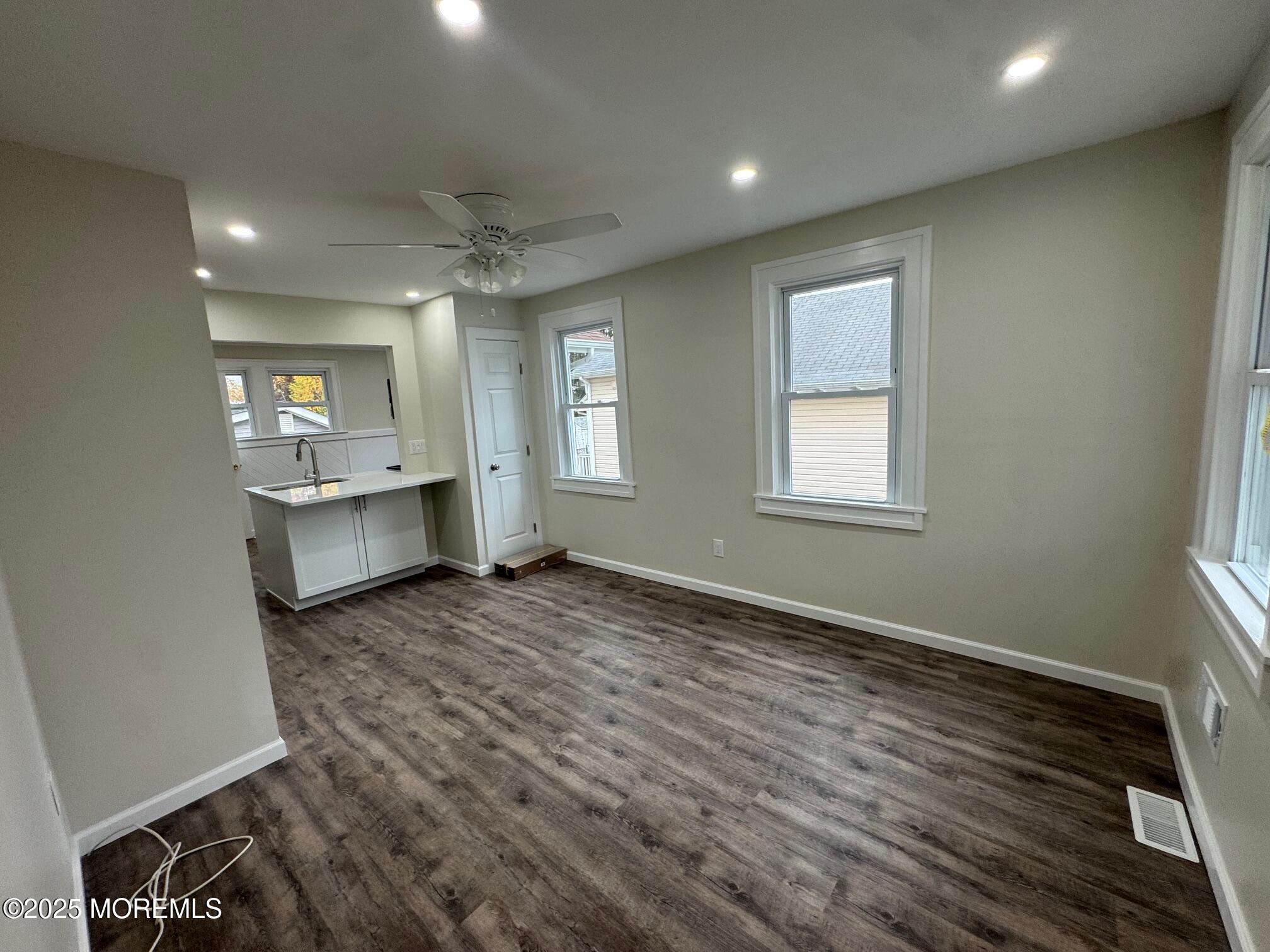 11 Washington Avenue, Unit 1 Leonardo, NJ 07737 - Photo 10 of 23 wooden floor in an empty room with a window