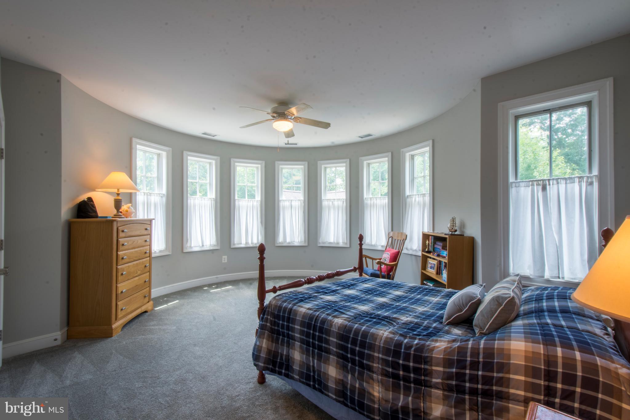 498 Ferry Point Road Annapolis, MD 21403 - Photo 22 of 102 Second Bedroom With Rounded Wall Of Windows