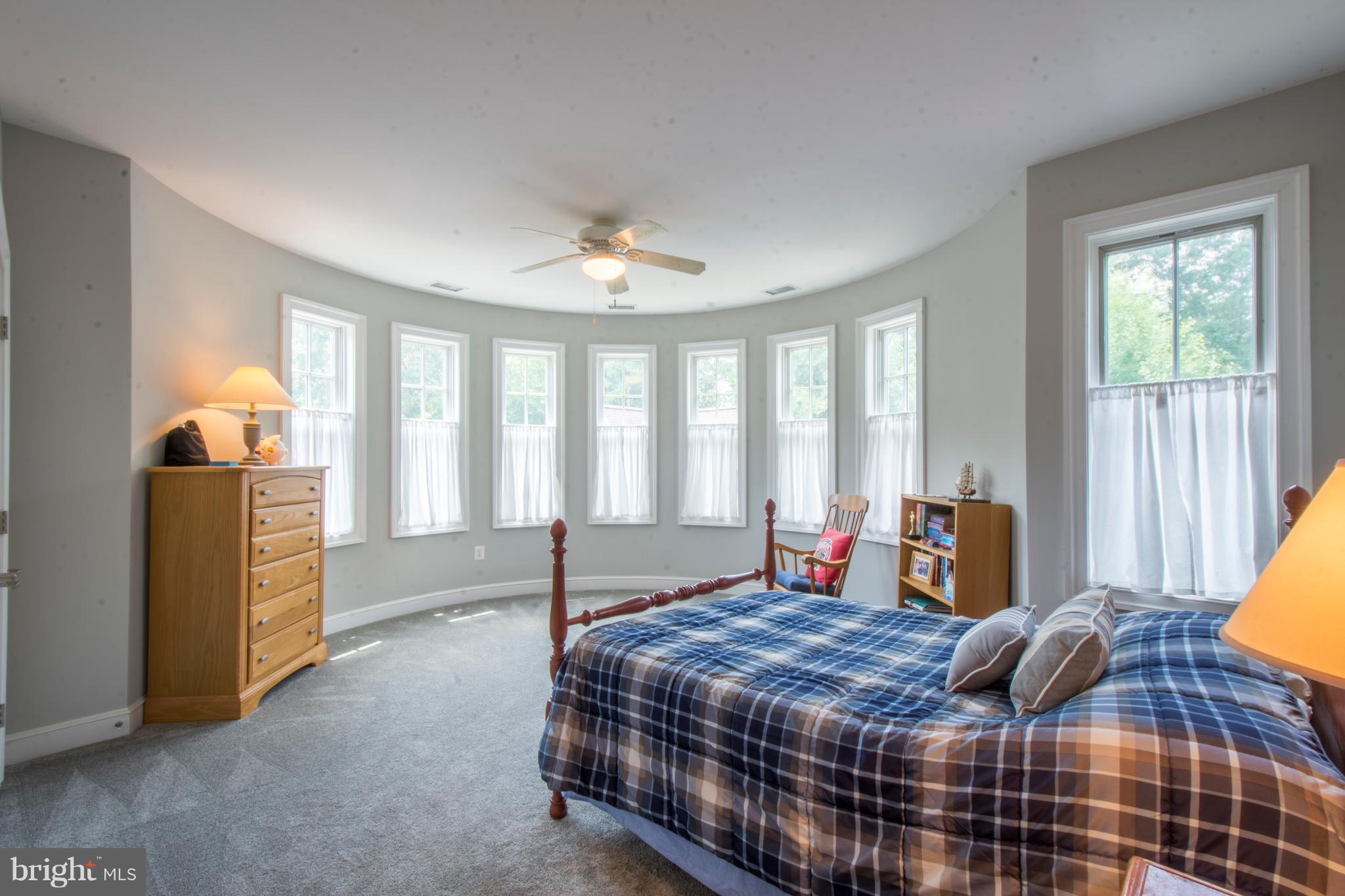 498 Ferry Point Road Annapolis, MD 21403 - Photo 35 of 102 Second Bedroom With Rounded Wall Of Windows