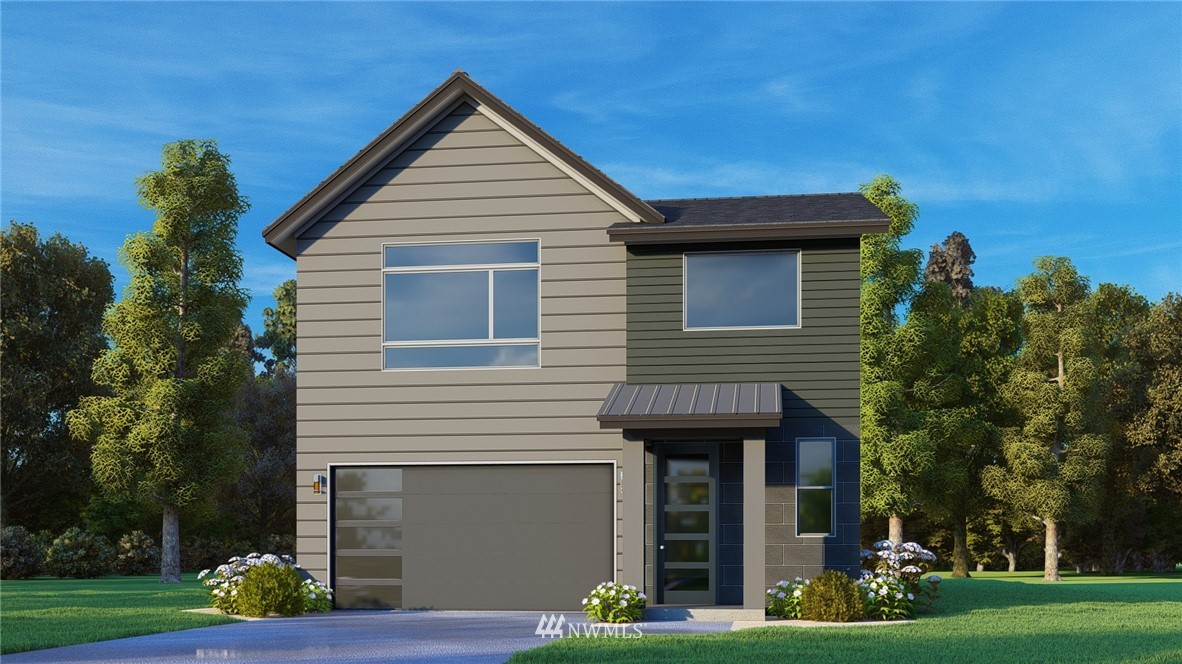 22212 17th Avenue West, Unit 5 Bothell, WA 98021 - Photo 1 of 37 a front view of a house with garden
