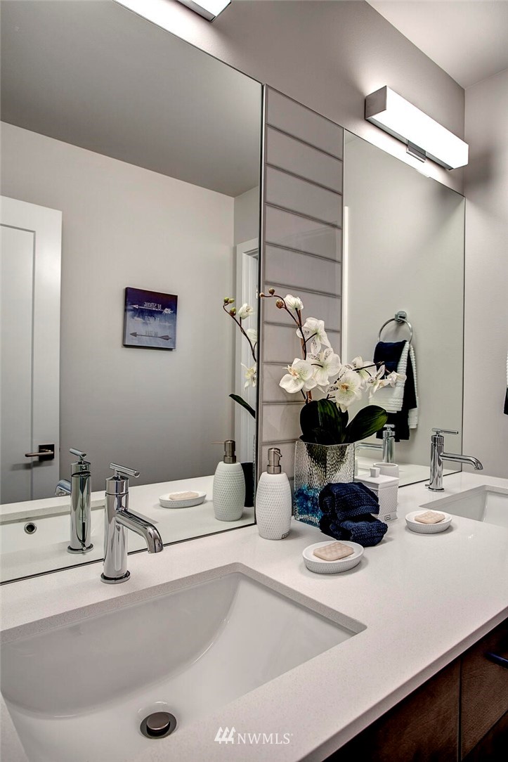 22212 17th Avenue West, Unit 5 Bothell, WA 98021 - Photo 36 of 37 a bathroom with a sink and a mirror
