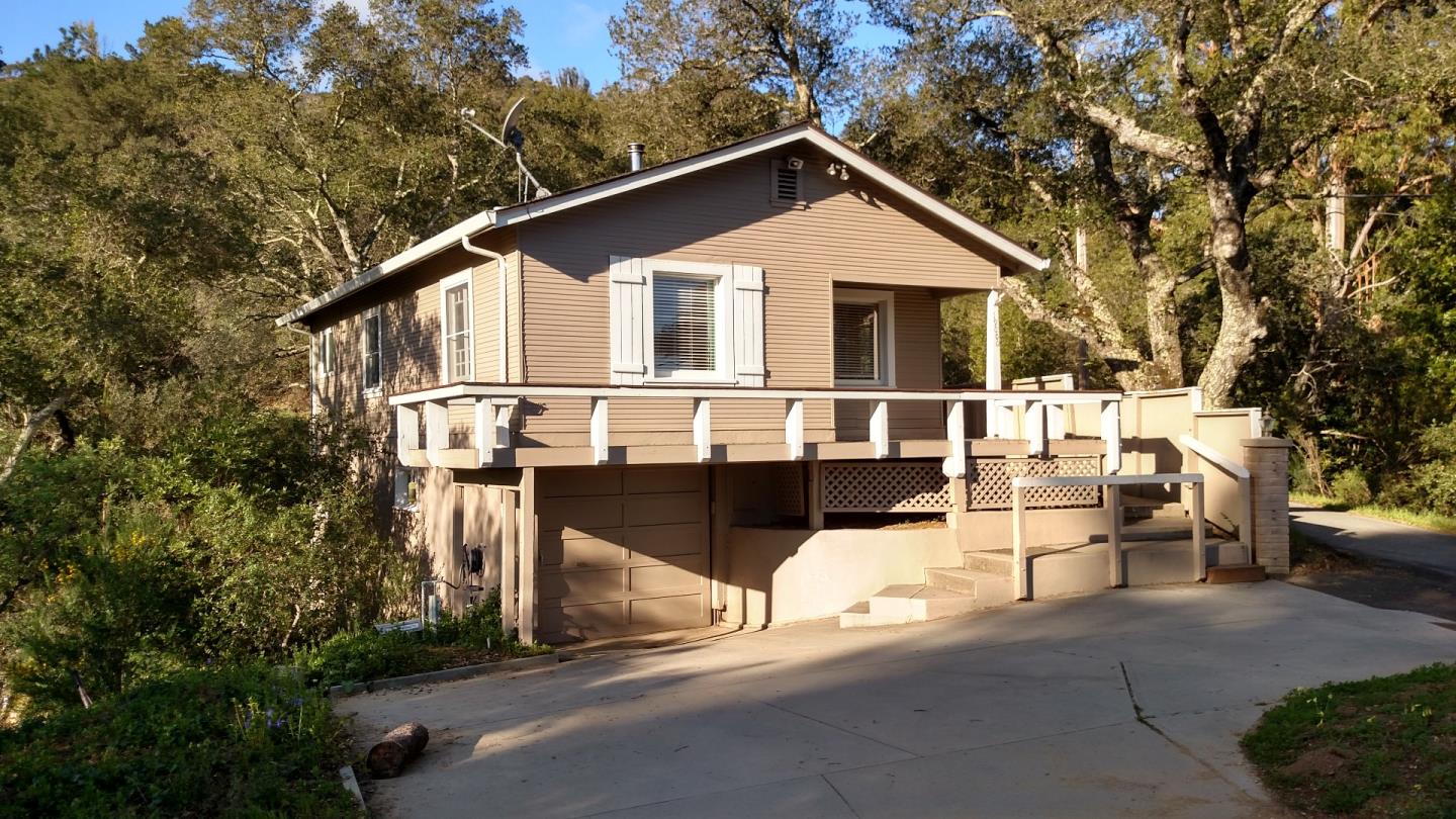 19000 Overlook Road Los Gatos, CA 95030 - Photo 2 of 25 a white house that has a tree in front of it