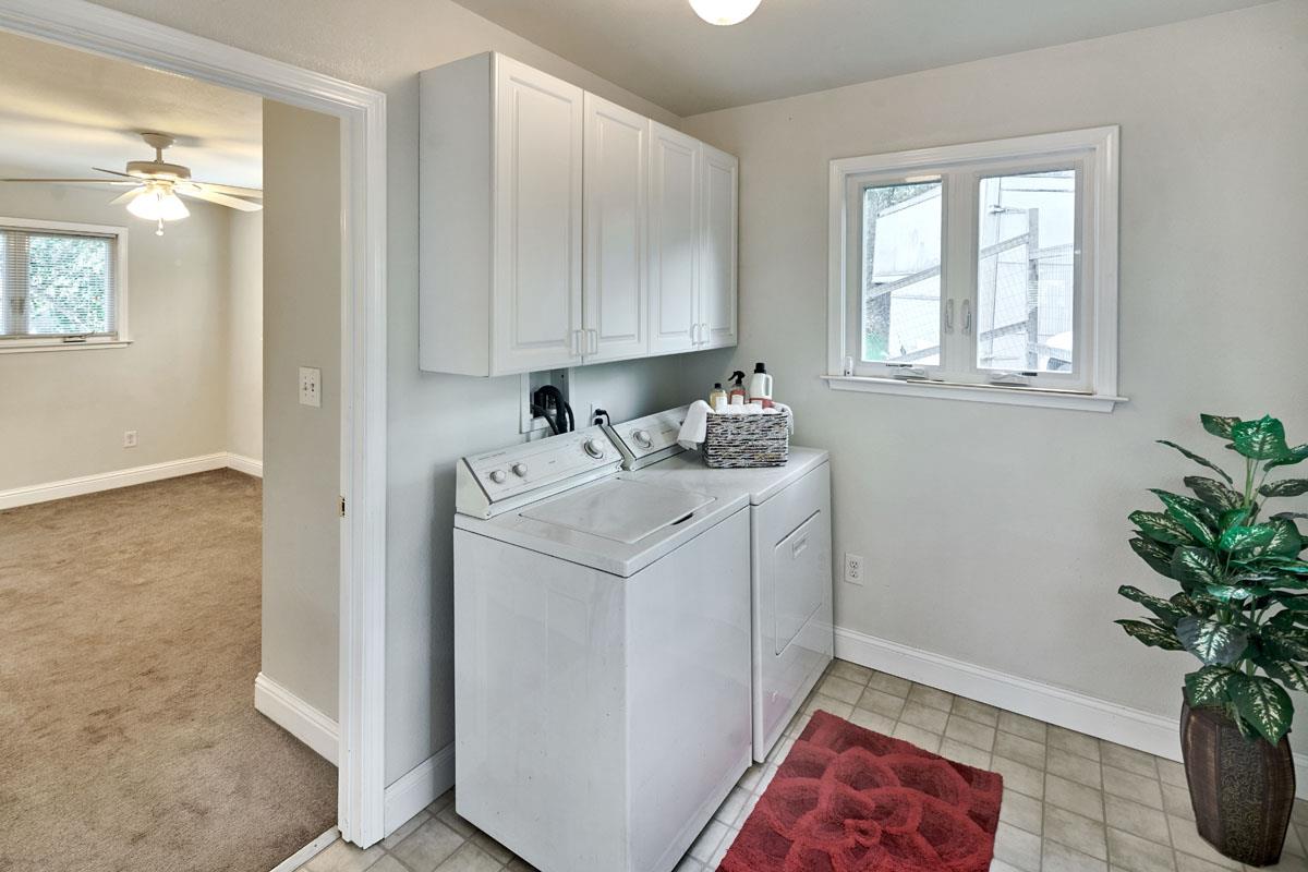 19000 Overlook Road Los Gatos, CA 95030 - Photo 24 of 25 a utility room with closet dryer and potted plants