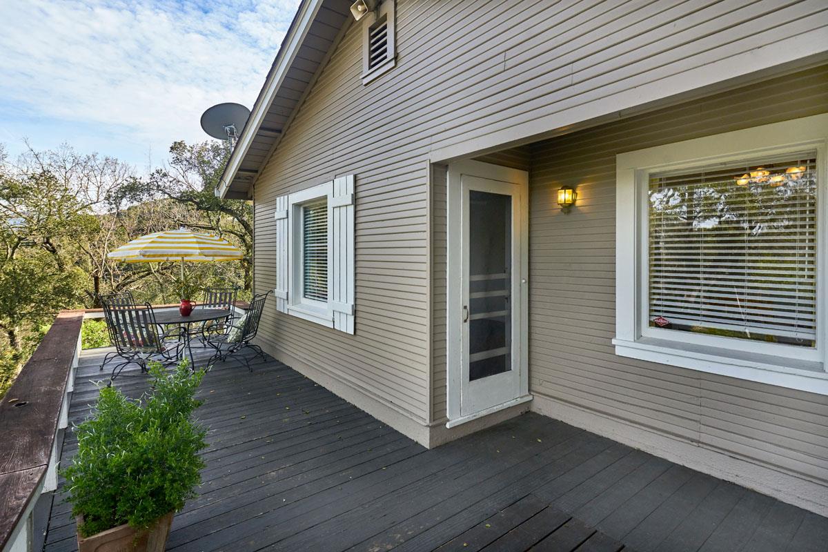 19000 Overlook Road Los Gatos, CA 95030 - Photo 4 of 25 a view of a house with a chairs and table in a patio