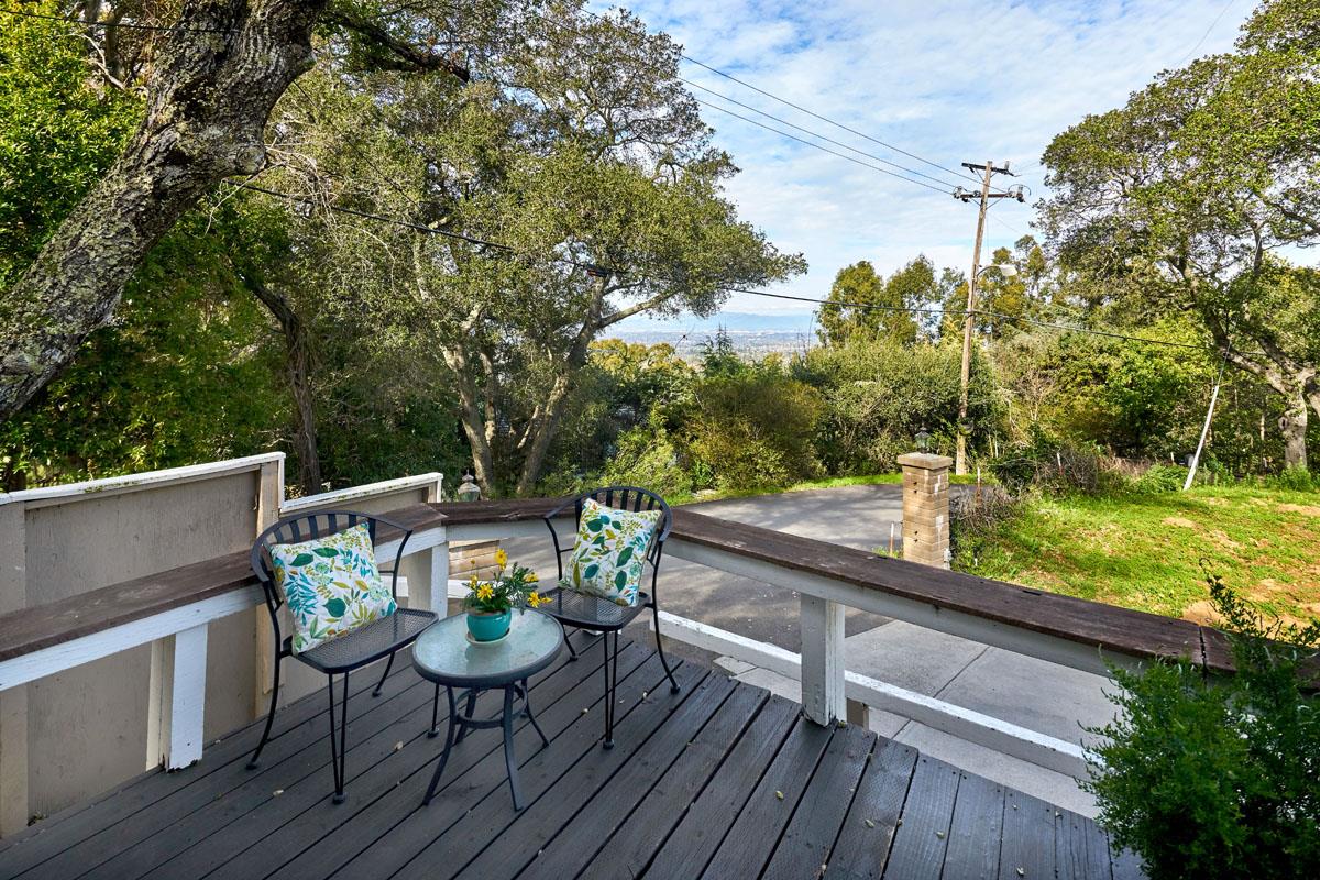 19000 Overlook Road Los Gatos, CA 95030 - Photo 6 of 25 a view of a chairs and table on the wooden deck