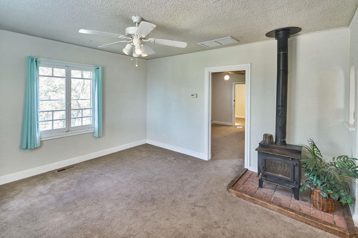 19000 Overlook Road Los Gatos, CA 95030 - Photo 8 of 25 wooden floor in an empty room with a window