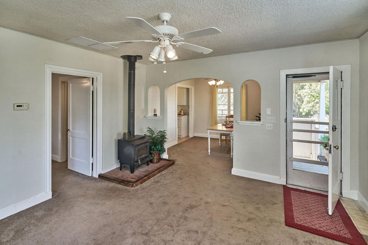 19000 Overlook Road Los Gatos, CA 95030 - Photo 10 of 25 a living room with furniture and a chandelier
