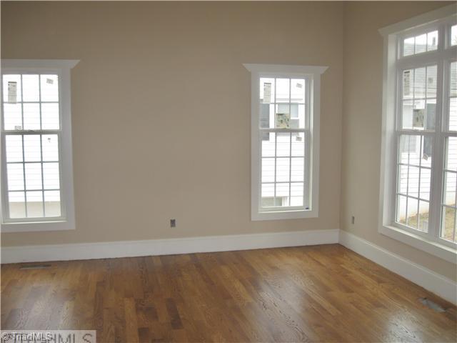 3559 Milhaven Road Winston-Salem, NC 27106 - Photo 2 of 8 Exterior Front. Living room with hardwood floors and 11 foot ceilings.