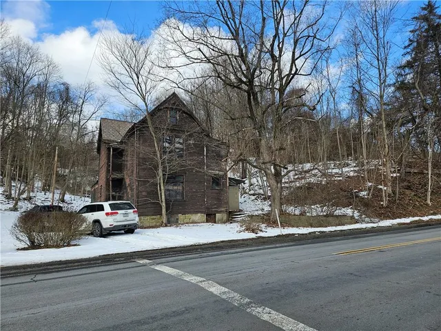 a car parked on the side of a street