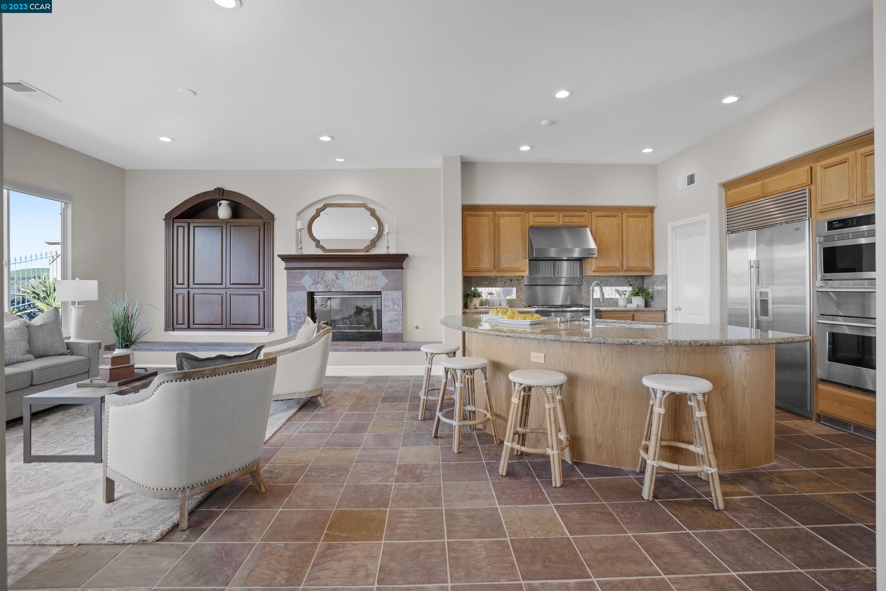 9548 Velvetleaf Circle San Ramon, CA 94582 - Photo 4 of 8 a large kitchen with a table and chairs in it