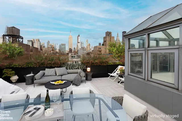 a outdoor living space with furniture and garden view