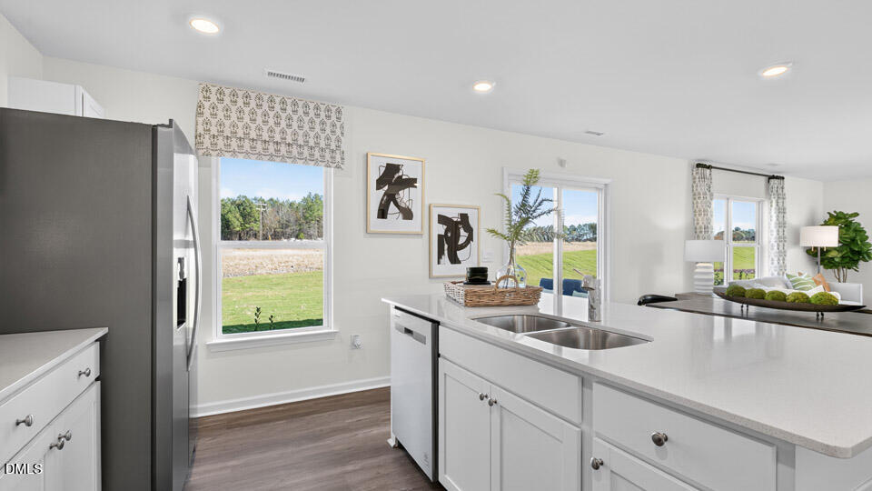 113 Ross Drive Stem, NC 27581 - Photo 15 of 42 a kitchen with a sink and cabinets
