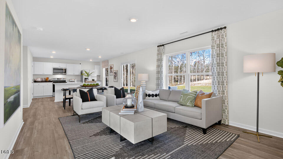 113 Ross Drive Stem, NC 27581 - Photo 18 of 42 a living room with furniture and view of kitchen
