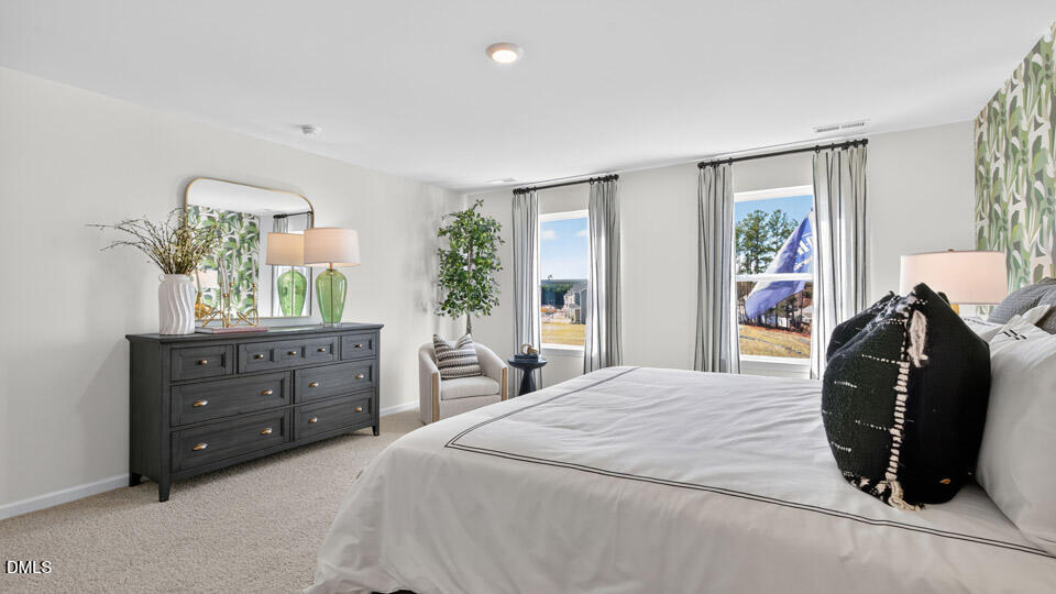 113 Ross Drive Stem, NC 27581 - Photo 26 of 42 a bedroom with a bed and window