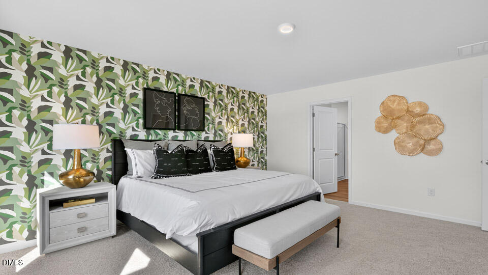 113 Ross Drive Stem, NC 27581 - Photo 27 of 42 a living room with furniture and a flat screen tv